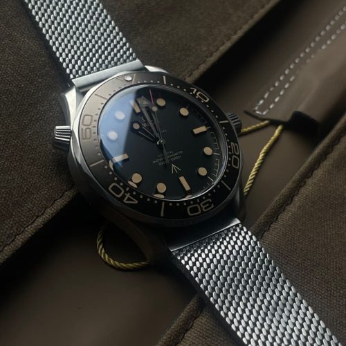 Omega Seamaster Diver 300M 007 Edition watch with a titanium mesh bracelet Swiss Grade