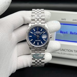 Rolex Datejust 36 reference 126234 in stainless steel and a blue dial, fluted bezel, and Jubilee bracelet.  Swiss 1:1