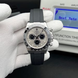 Rolex Oyster Perpetual Cosmograph Daytona in 18 ct white gold with a grey dial, black monobloc Cerachrom bezel, and an Oysterflex bracelet.  Swiss 1:1