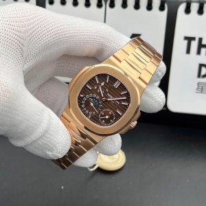 Patek Philippe Nautilus Ref. 5712/1R-001 watch in rose gold with a brown sunburst dial. Swiss 1:1