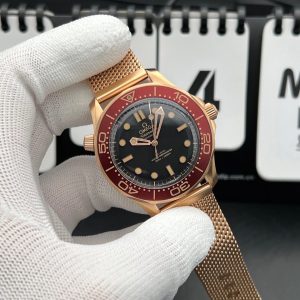 Omega Seamaster Diver 300M Co-Axial Master Chronometer watch in an exclusive Bronze Gold alloy with a burgundy oxalic anodized aluminum bezel and a matching mesh bracelet. swiss 1:1 grade