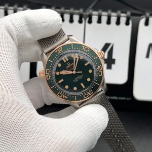 Omega Seamaster Diver 300M watch in grade 2 titanium and 9K bronze gold with a green aluminum dial and bezel, and a mesh bracelet swiss 1:1 grade