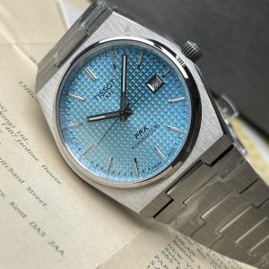 Tissot PRX Powermatic 80 featuring a distinct ice blue waffle dial european grade